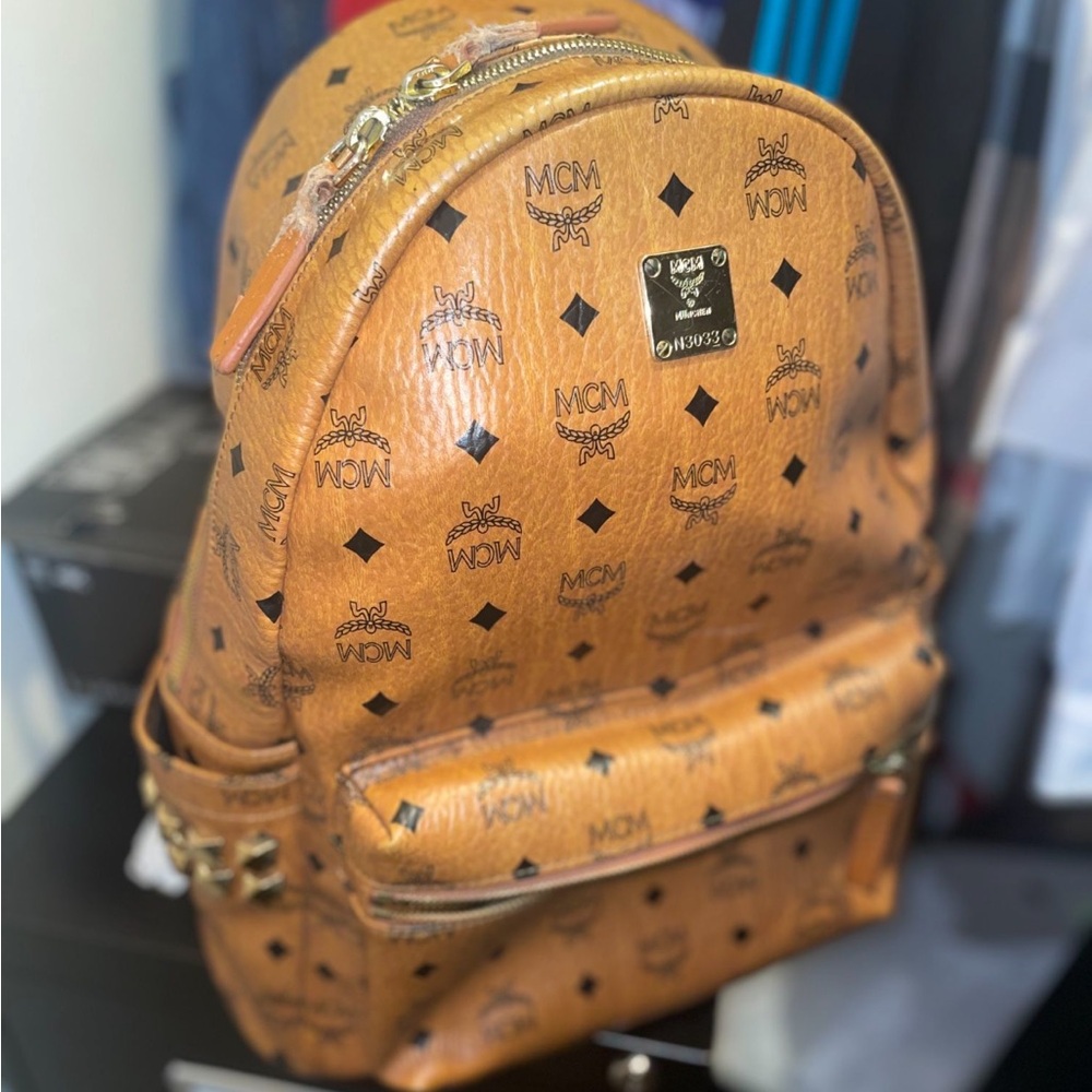 MCM Tan Backpack with Iconic Logo Pattern